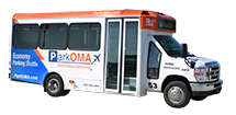 A ParkOMA shuttle bus